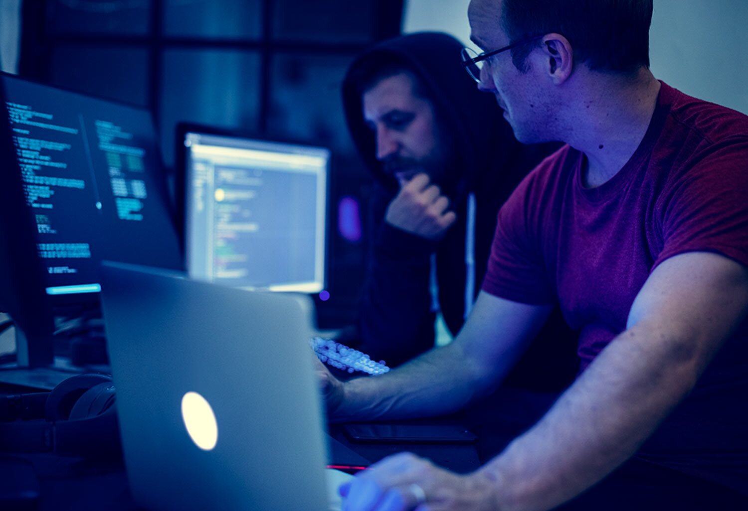 two male computer programmers working